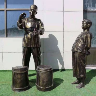 玻璃钢仿铜打油人物雕塑